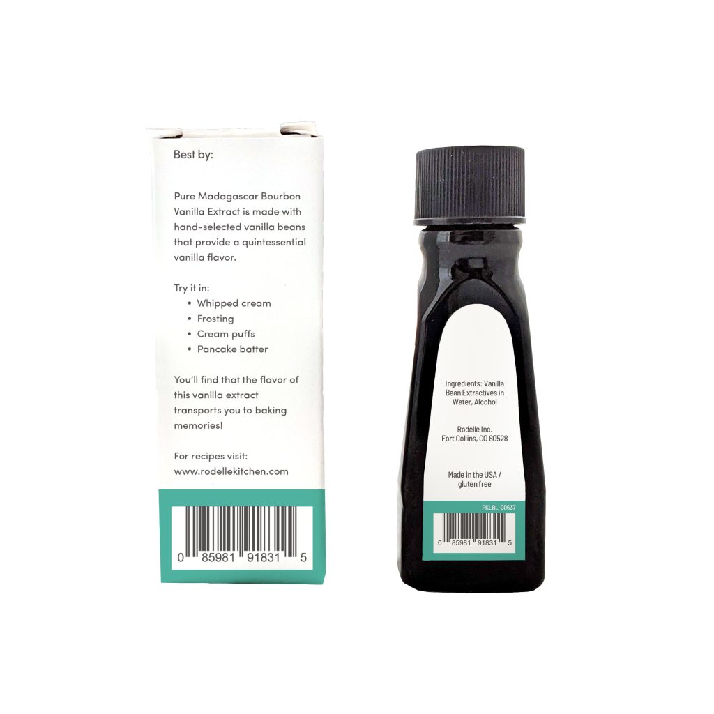 back of a bottle of pure vanilla extract and carton on white background