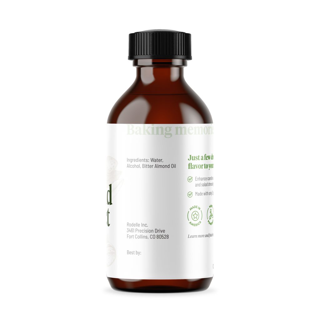 side image of front image of Rodelle 2oz Almond Extract in a round glass bottle showing the ingredient information