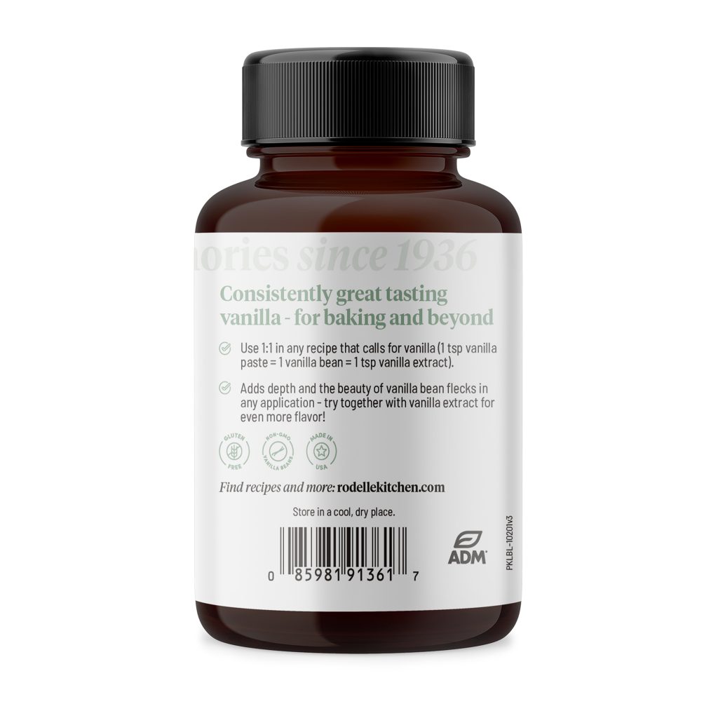 back image of Rodelle's 4oz natural vanilla bean paste in a round glass bottle showing a description of the product along with the UPC