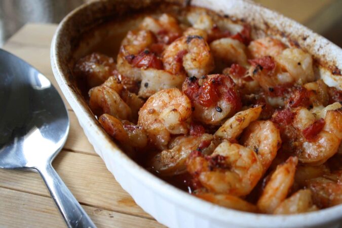 Baked shrimp with marinara close up