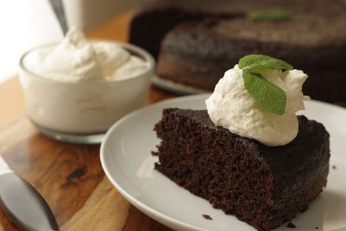 Finished product of the whipped cream bailey's chocolate cake