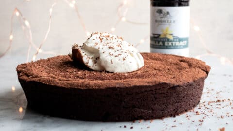 Rodelle Chocolate flourless cake with vanilla in the background