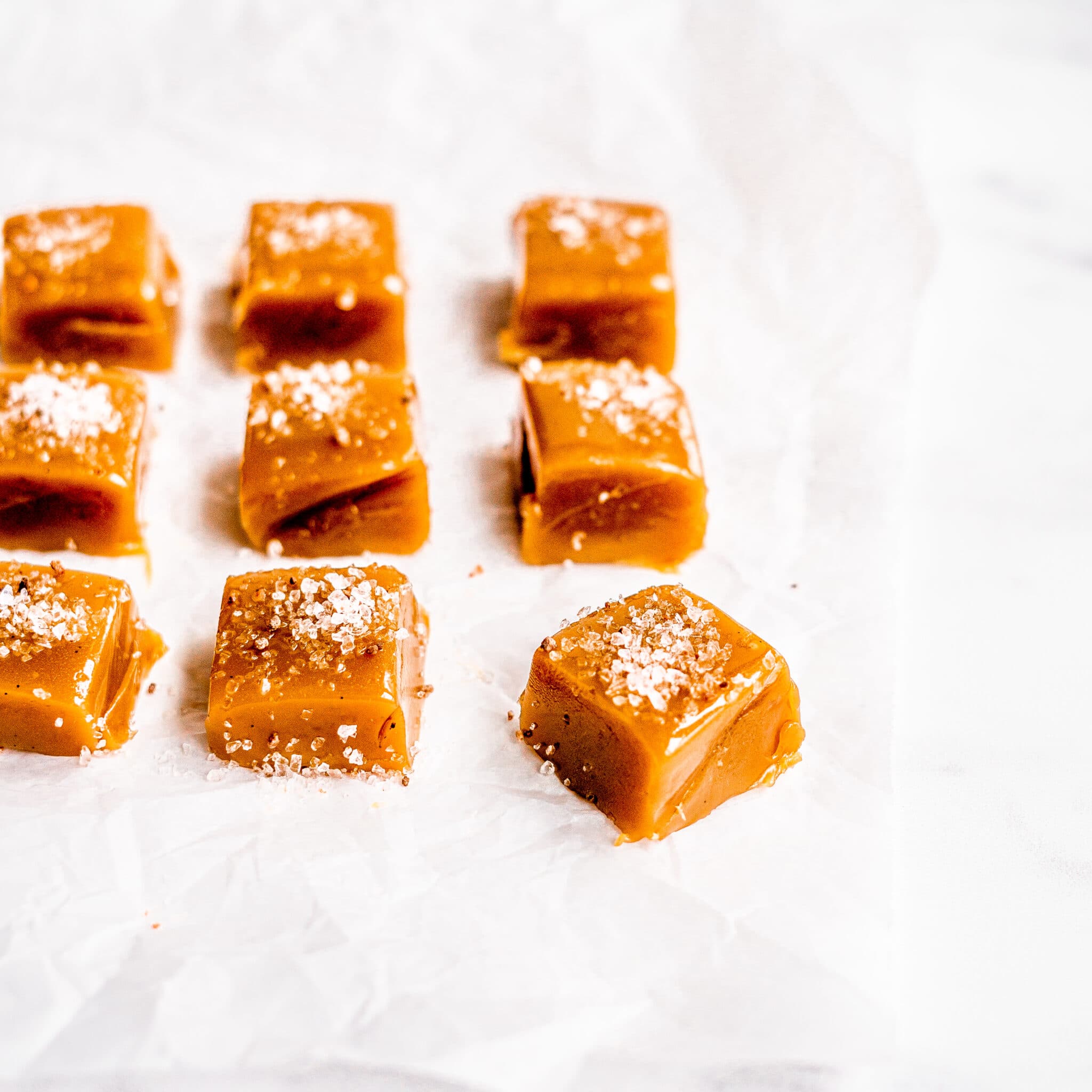 https://www.rodellekitchen.com/wp-content/uploads/2020/11/Pink-Himalayan-Sea-Salt-Caramels-Served-Close-Up-2-Square-scaled.jpg