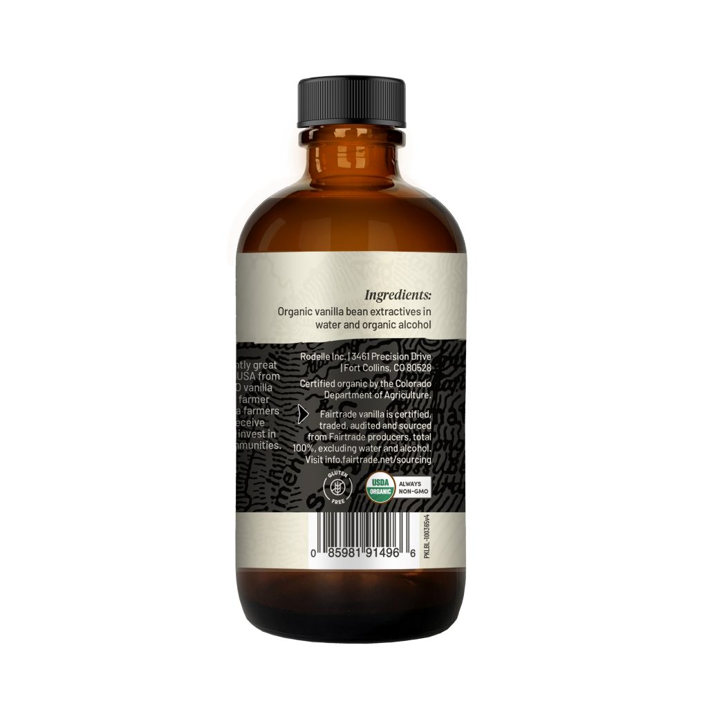back image of Rodelle 4oz Organic Fairtrade pure vanilla extract in a round glass bottle showing a description of the product along with the UPC