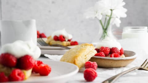 vanilla raspberry vanilla shortcakes on neutral background