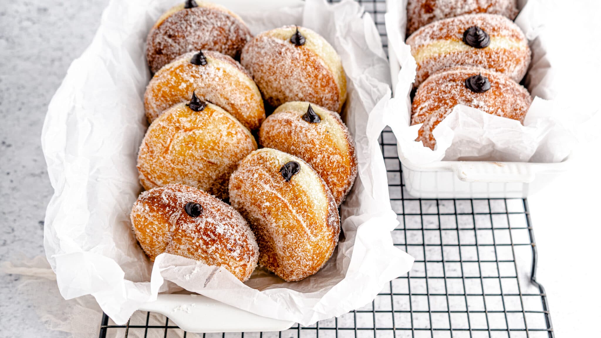 https://www.rodellekitchen.com/wp-content/uploads/2021/08/Dark-Chocolate-Ganache-Filled-Donuts-with-Vanilla-Sugar-hero-2-scaled.jpg