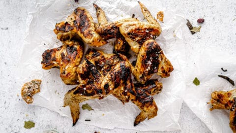 Turkey Brined Chicken Wings plated on a white backdrop