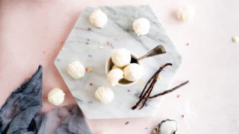 Overhead shot of Edible Sugar Cookie Dough Truffles in a bowl with a spoon