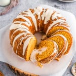 Marshmallow stuffed sweet potato bundt cake sliced on parchment paper