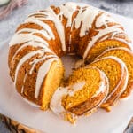 Marshmallow stuffed sweet potato bundt cake sliced on parchment paper