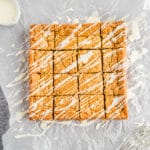 Chewy Vanilla Blondies sliced on neutral background