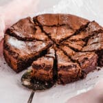 Chocolate Crackly Brownie Cake Sliced on neutral background