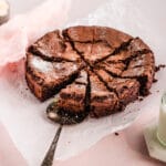 Chocolate Crackly Brownie Cake Sliced on neutral background