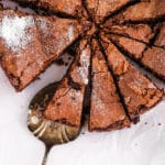 Close up of Chocolate Crackly Brownie Cake Sliced on neutral background