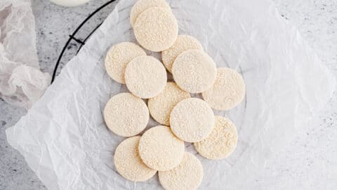Shortbread cookies piled on neutral background