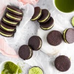 Matcha filled cocoa cookies on neutral background