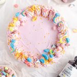 Frozen ice cream pie on a plate with Lucky Charms marshmallows