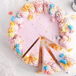 Frozen ice cream pie on a plate with Lucky Charms marshmallows