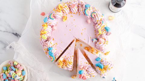 Frozen ice cream pie on a plate with Lucky Charms marshmallows
