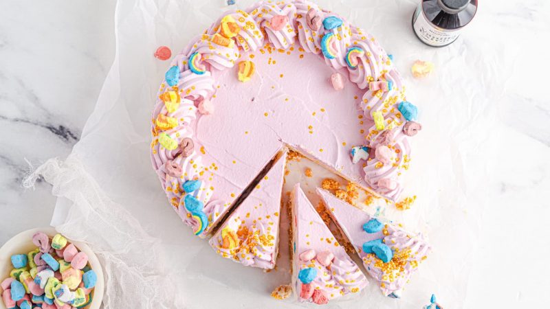Frozen ice cream pie on a plate with Lucky Charms marshmallows