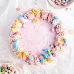 Frozen ice cream pie on a plate with Lucky Charms marshmallows