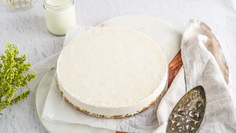 Vanilla cheesecake made with cashews on a white plate