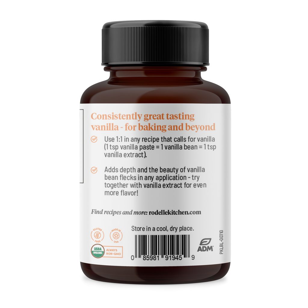 back image of Rodelle's 2oz organic vanilla bean paste in a round glass bottle showing a description of the product along with the UPC