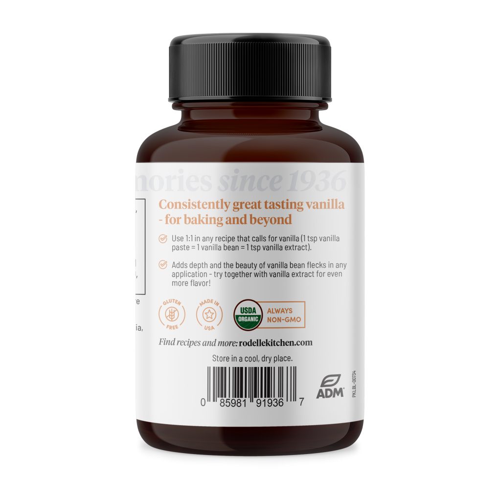 back image of Rodelle's 4oz organic vanilla bean paste in a round glass bottle showing a description of the product along with the UPC
